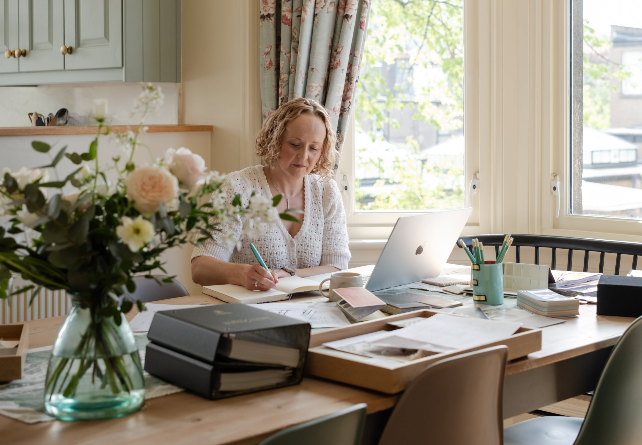 Interior designer working at desk