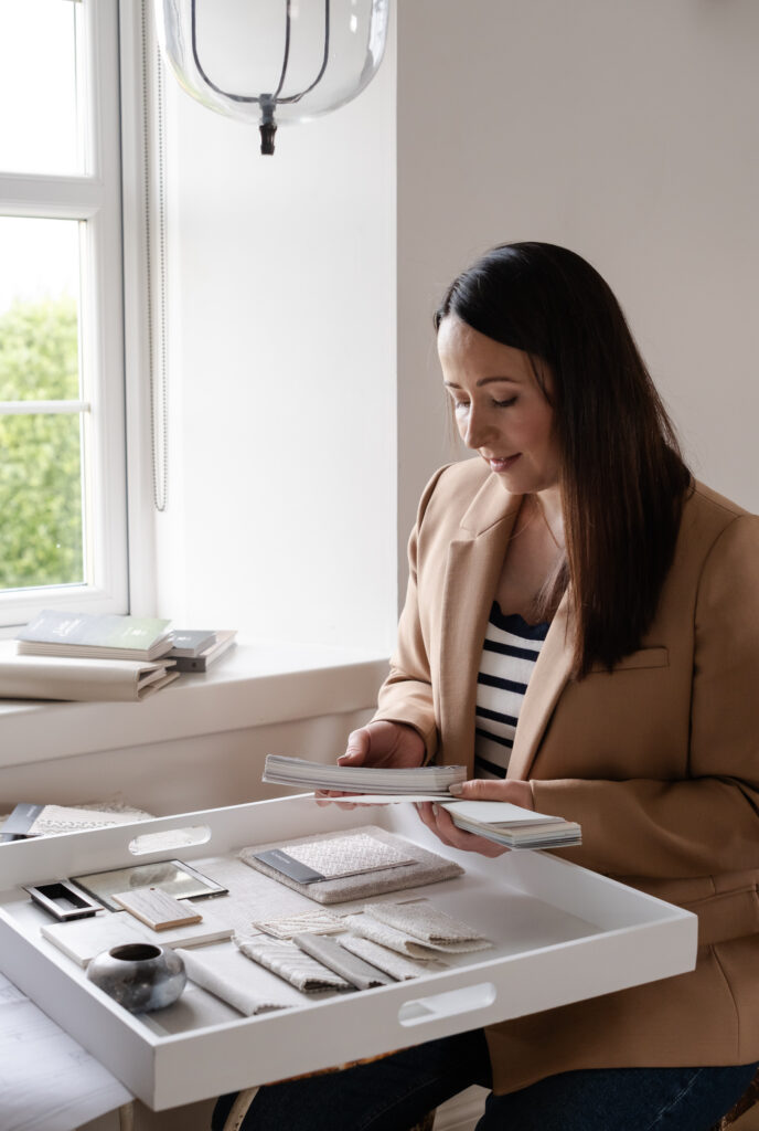 female interior design working at table