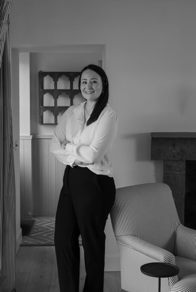 full length female business owner in lounge