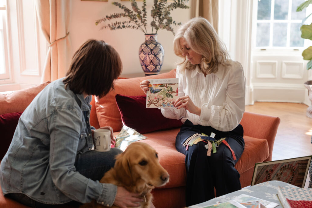 Interior designer working with client to choose some fabrics