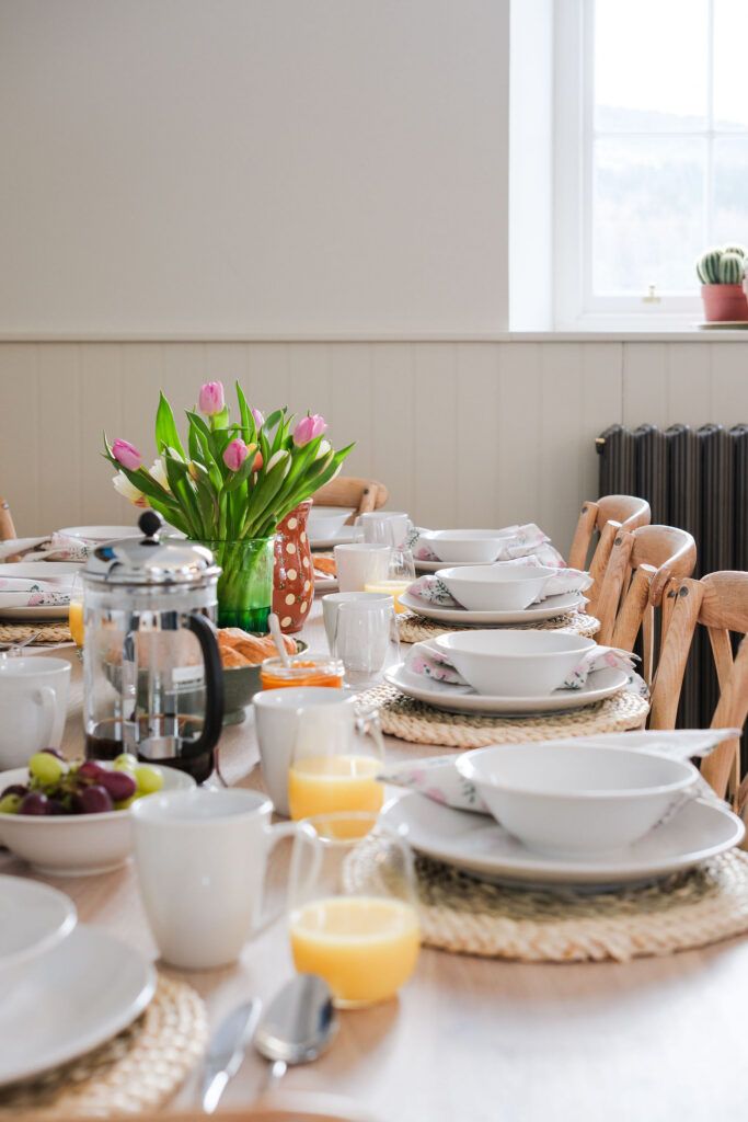 Styled kitchen and breakfast table at The Schoolhouse, Straloch Estate